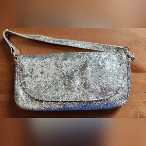 mark. Silver Glitter Clutch Wristlet